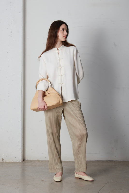 Borsa in vera pelle con manici in metallo