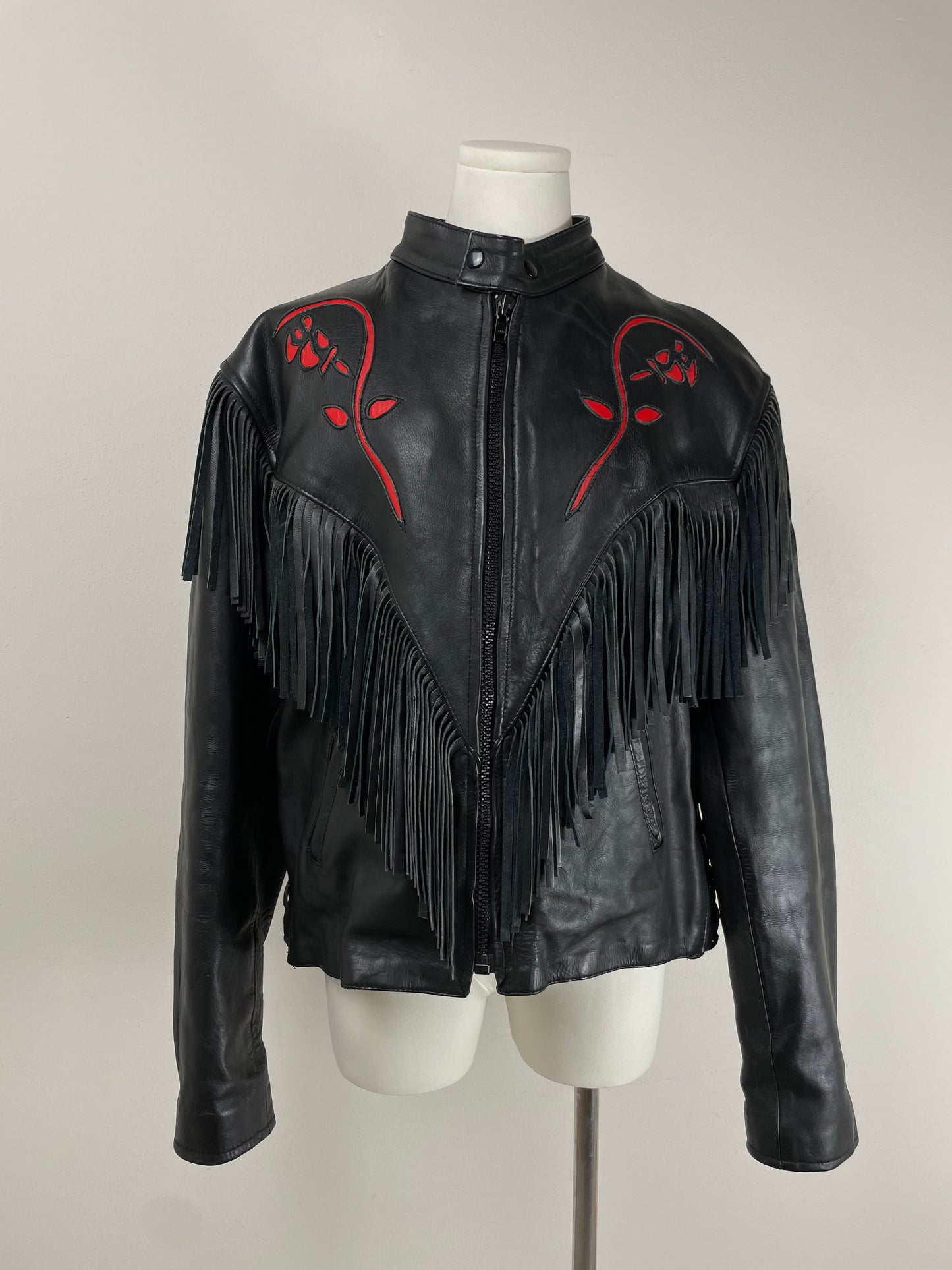 Chiodo vintage in pelle con frange e rose