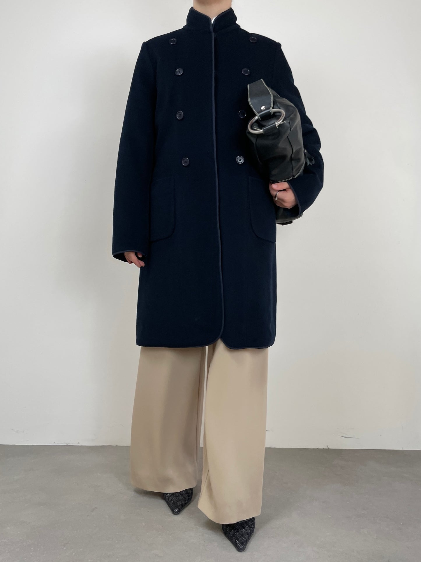 Soprabito reversibile, un lato in lana e cashmere e l’altro impermeabile