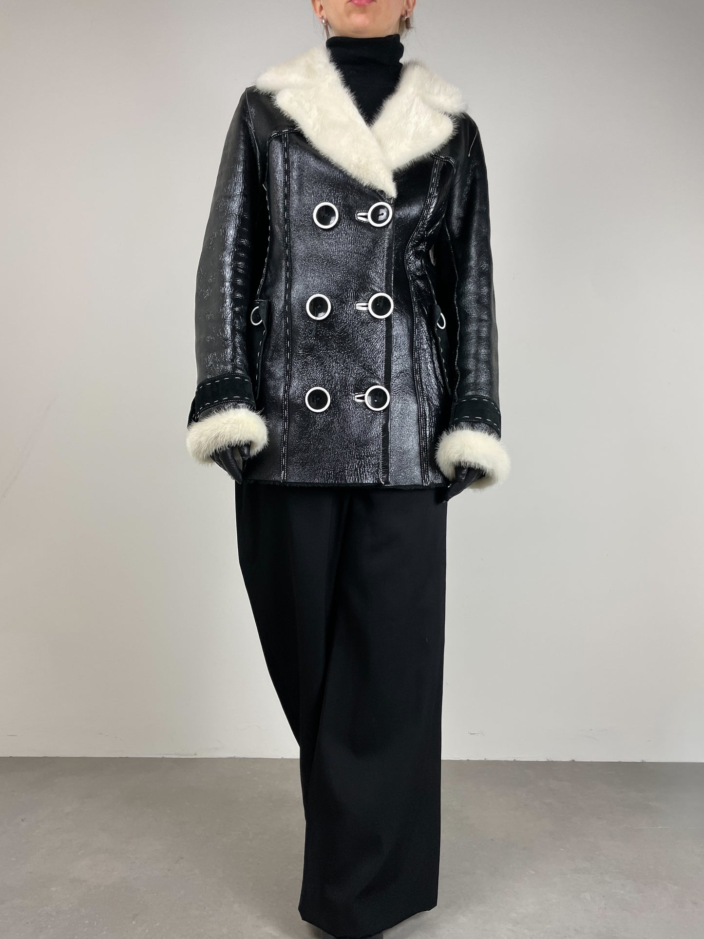 Shearling in pelle verniciata