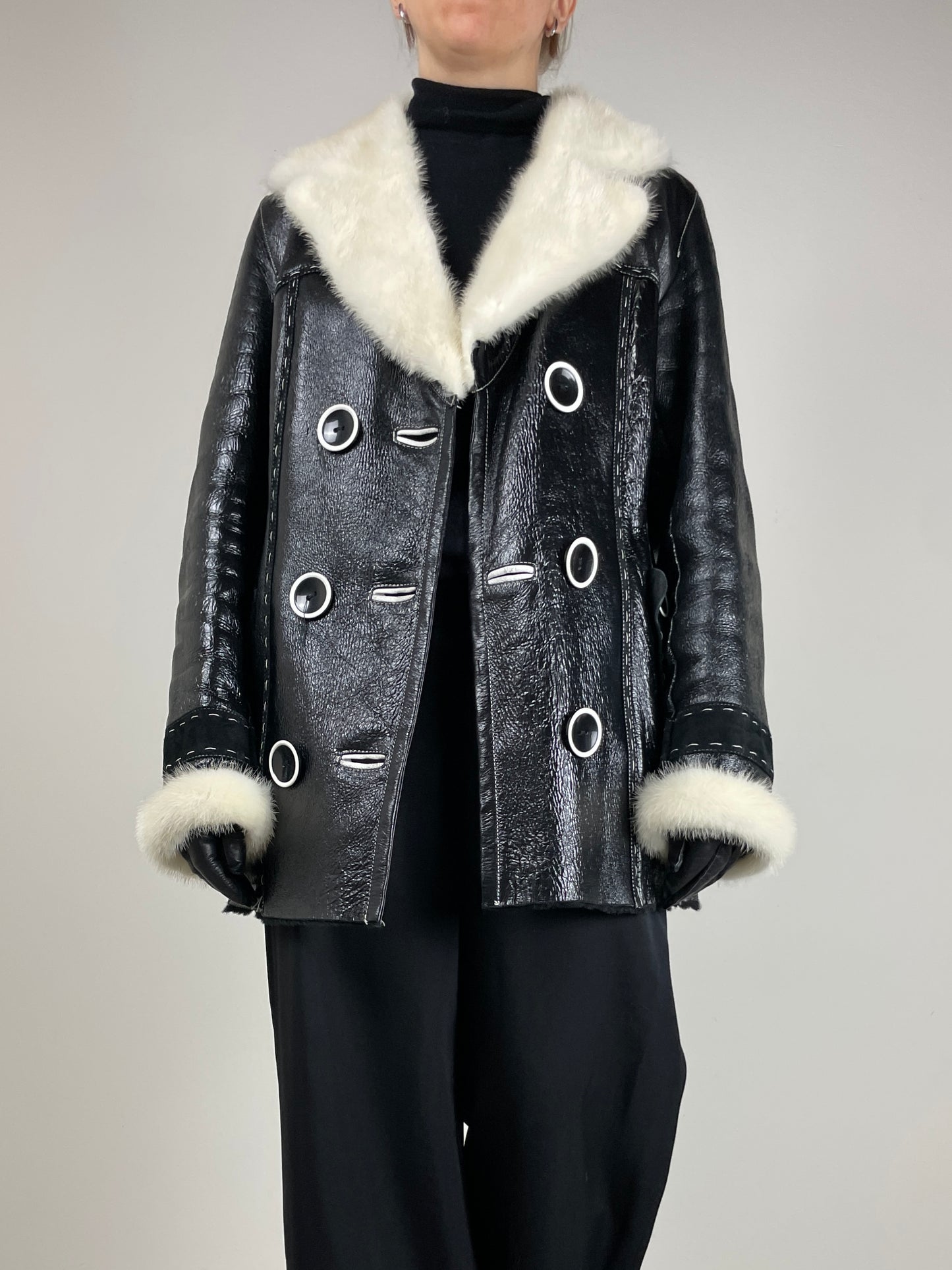 Shearling in pelle verniciata