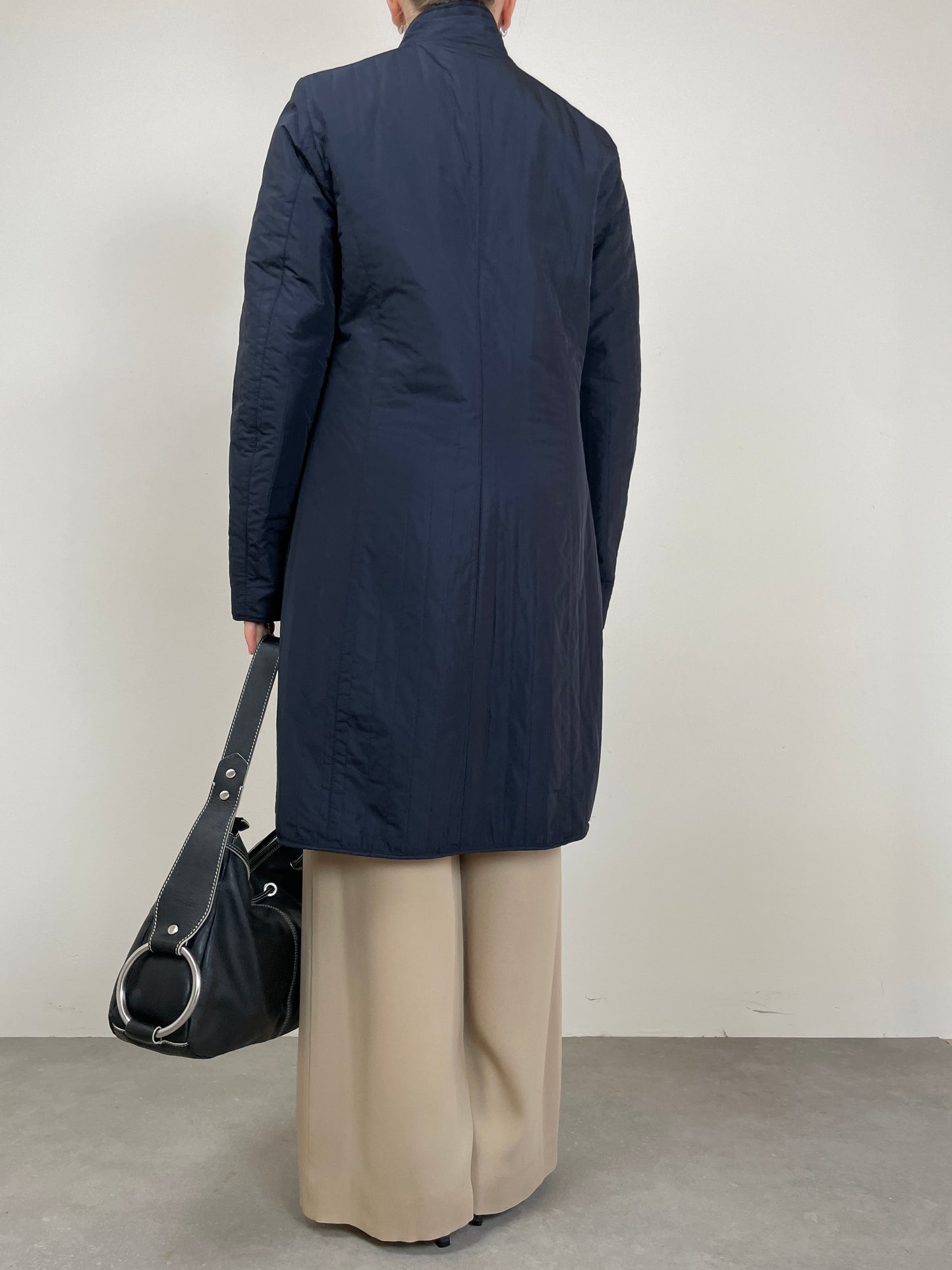 Soprabito reversibile, un lato in lana e cashmere e l’altro impermeabile