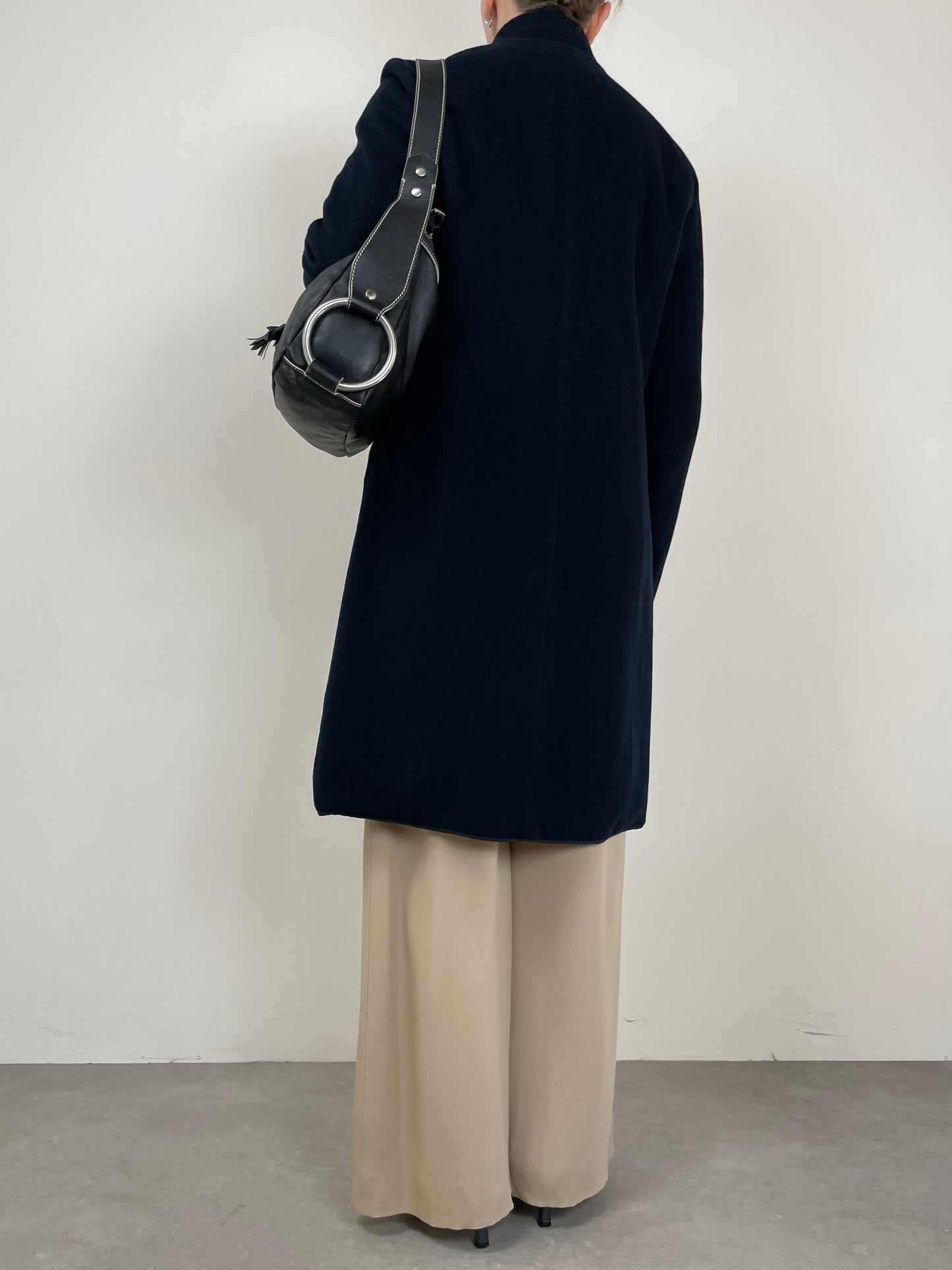 Soprabito reversibile, un lato in lana e cashmere e l’altro impermeabile