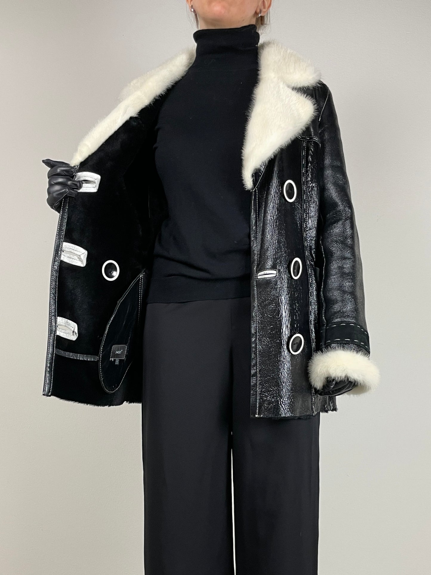 Shearling in pelle verniciata