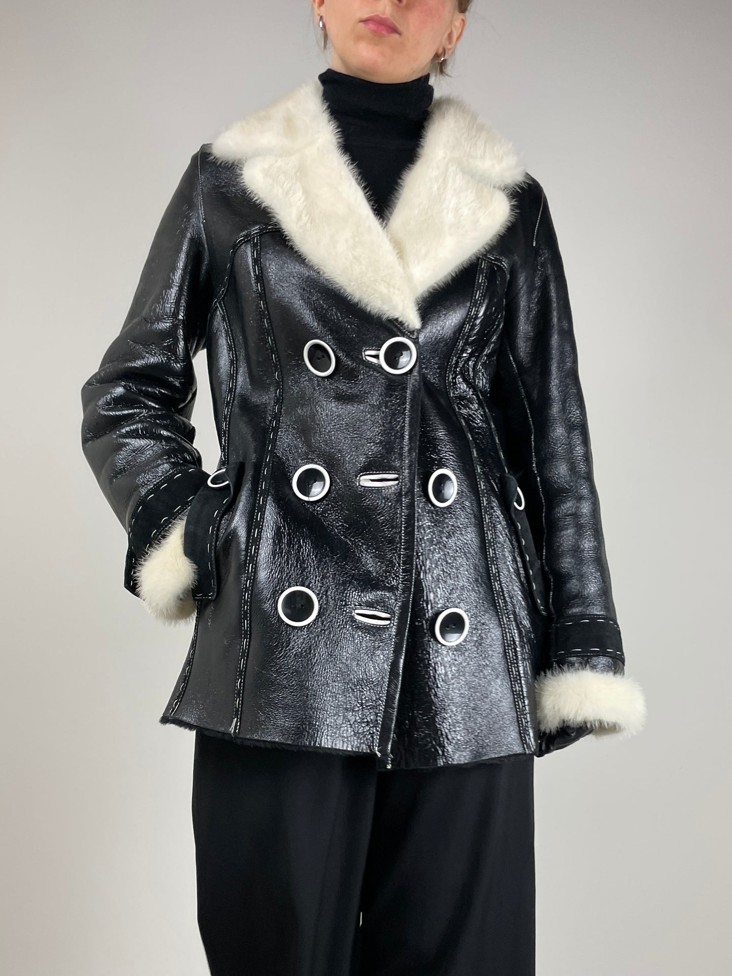 Shearling in pelle verniciata
