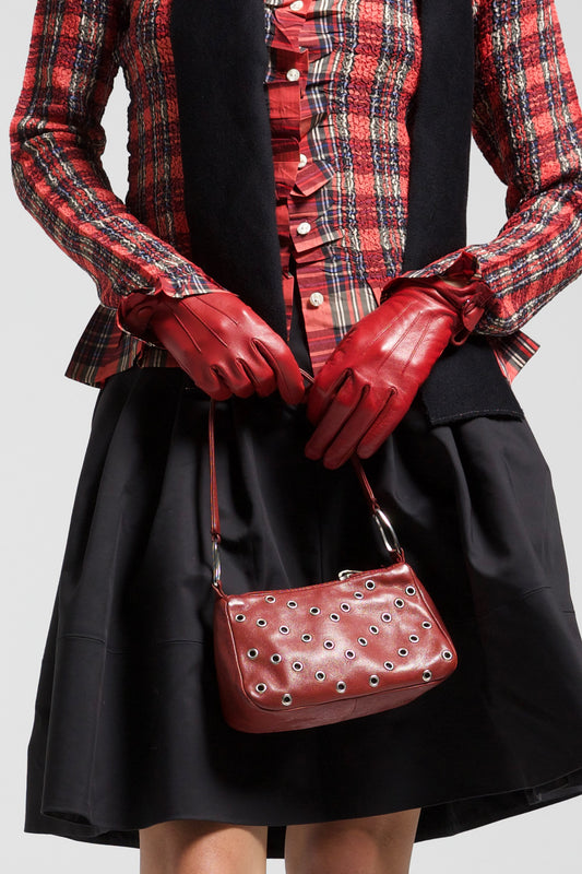 Borsetta in vera pelle bordeaux con occhielli