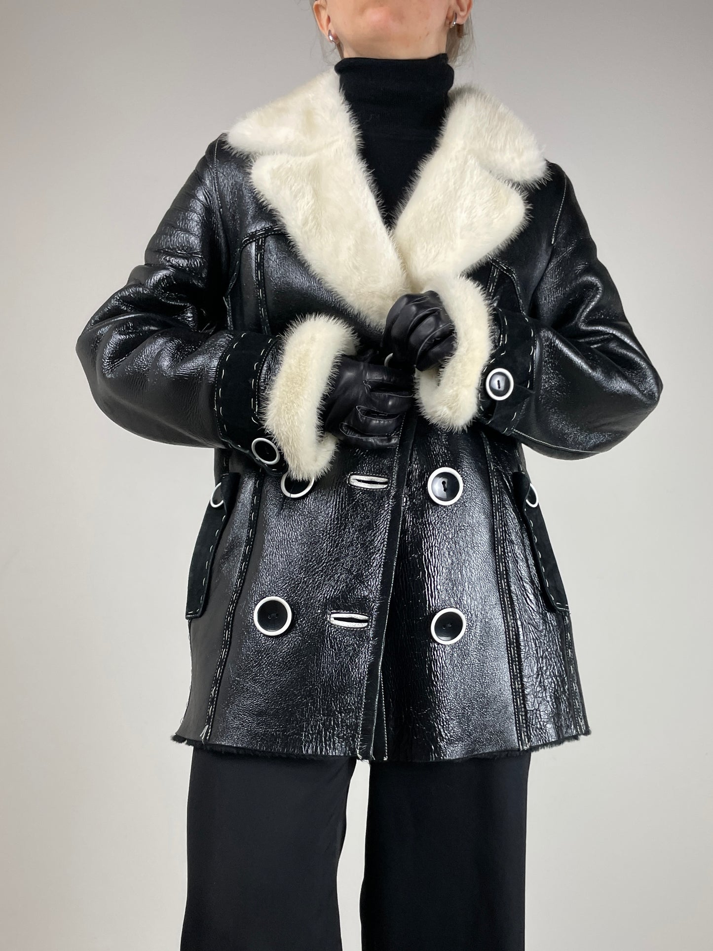 Shearling in pelle verniciata