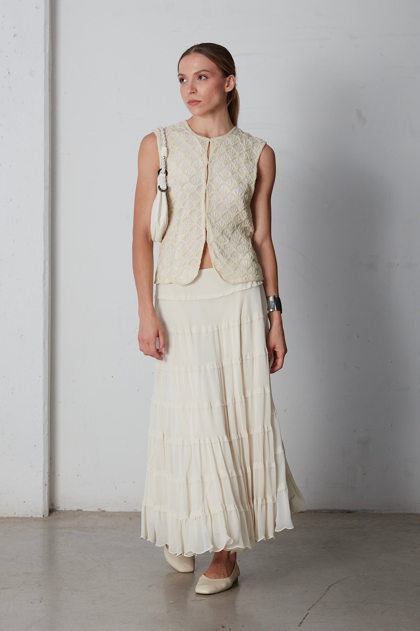 Gilet in seta ricamato con perline