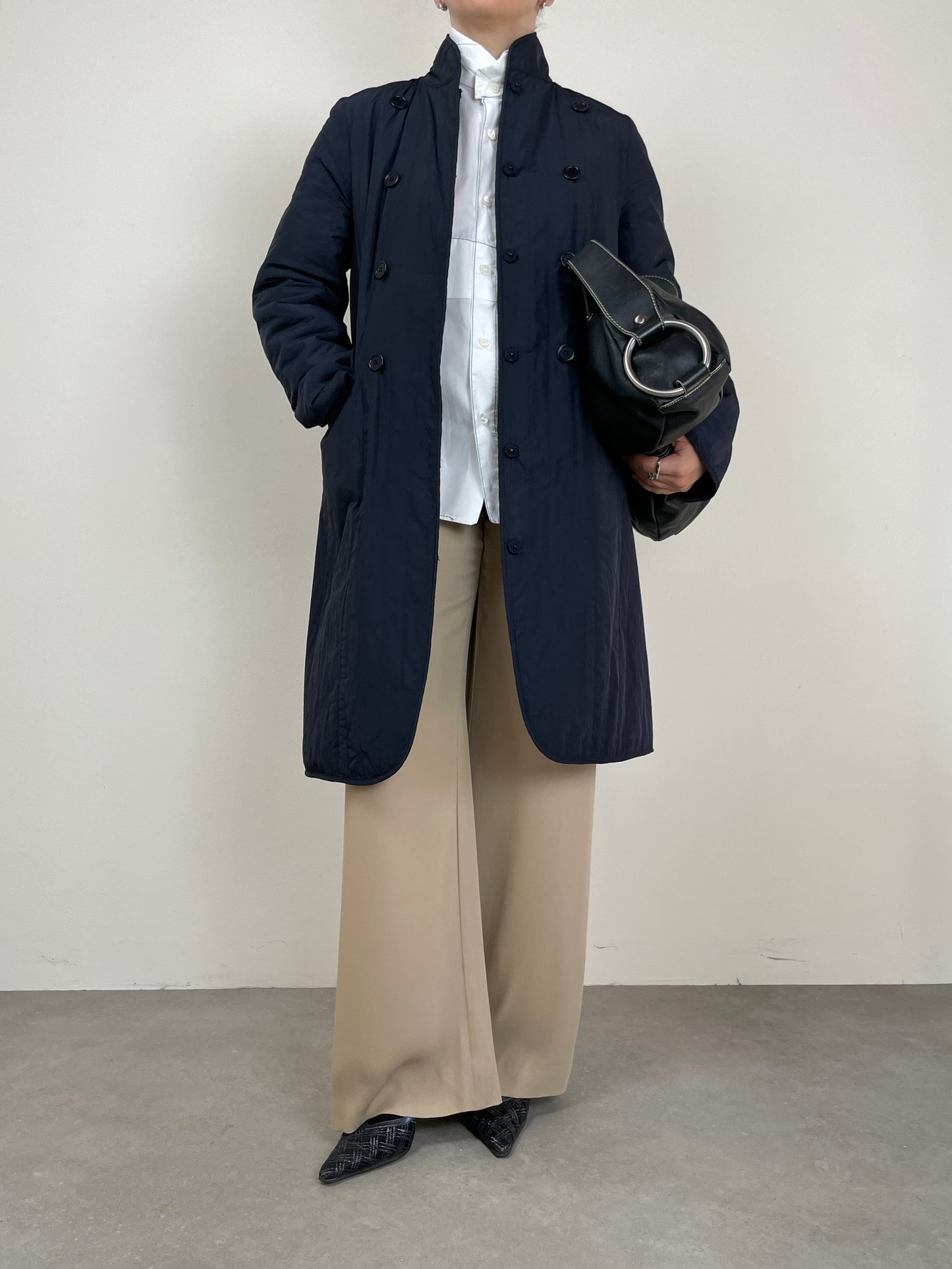 Soprabito reversibile, un lato in lana e cashmere e l’altro impermeabile