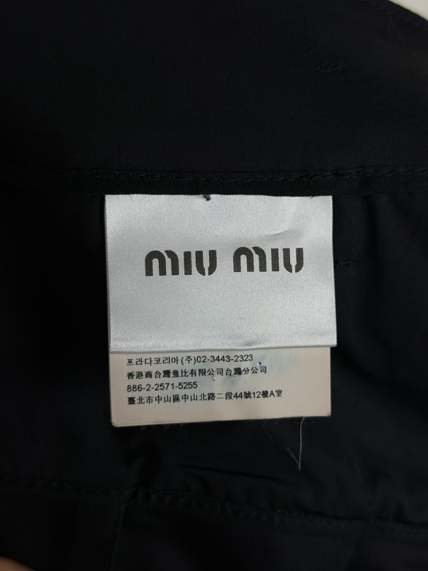 MIU MIU gonna a trapezio con baschina
