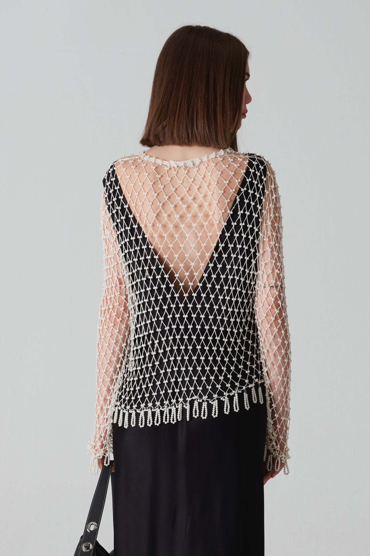 Cardigan all’uncinetto con perline