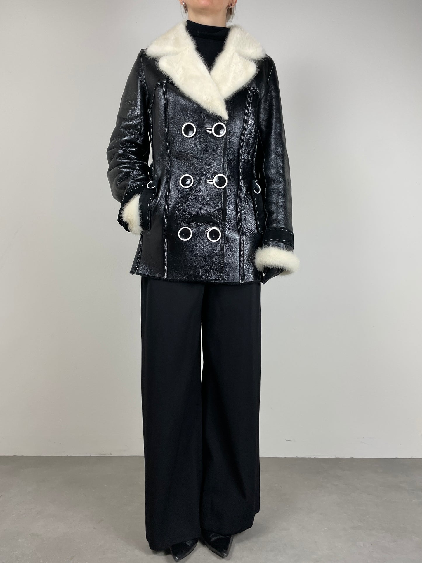 Shearling in pelle verniciata