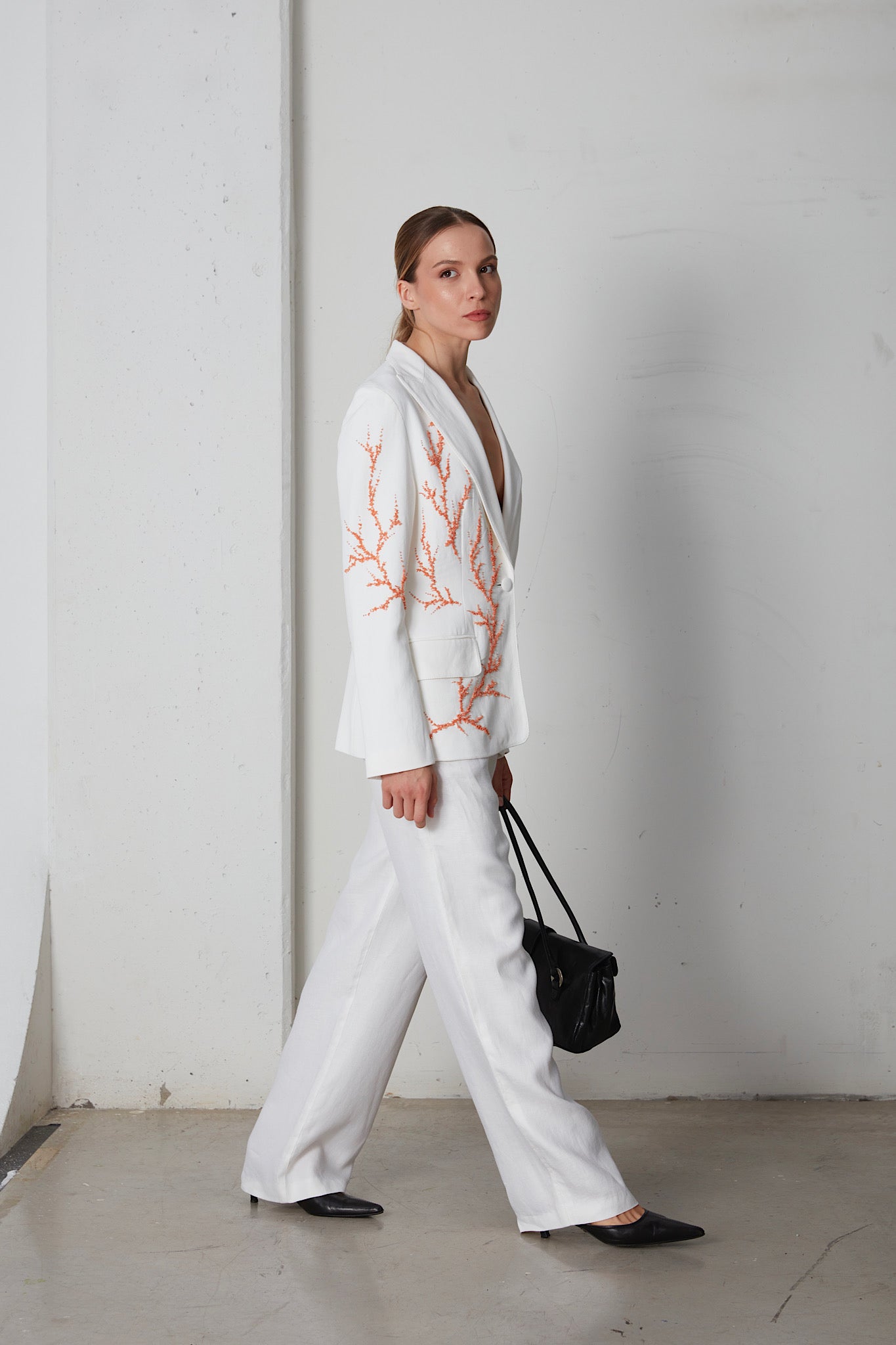 Blazer con ricamo a corallo