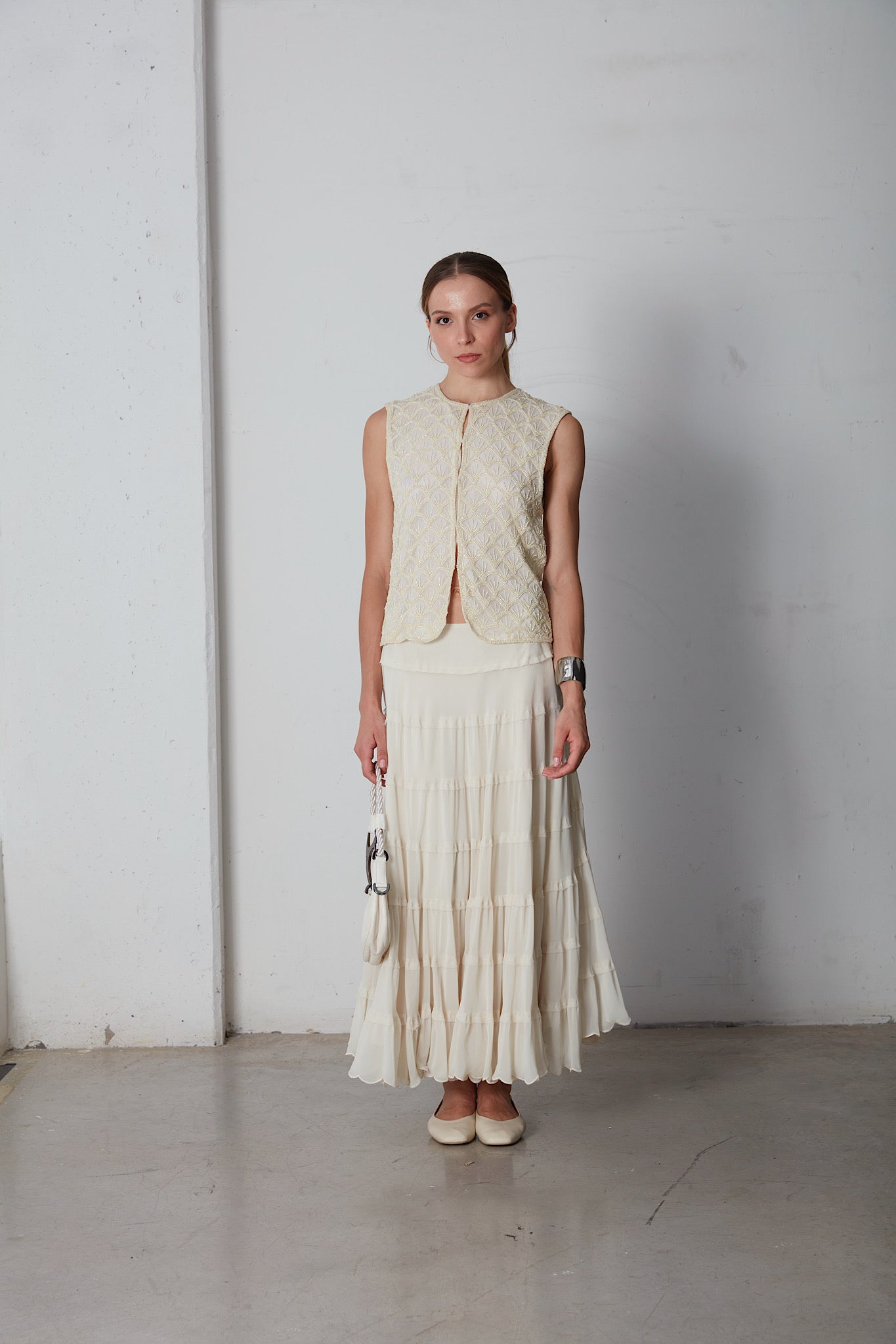 Gilet in seta ricamato con perline