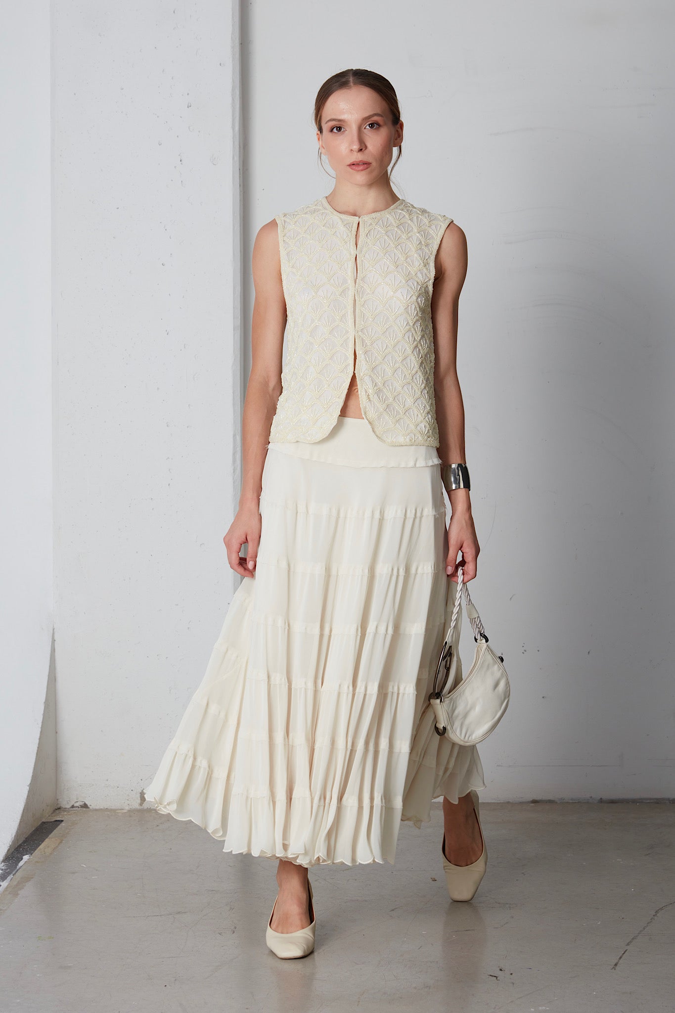 Gilet in seta ricamato con perline