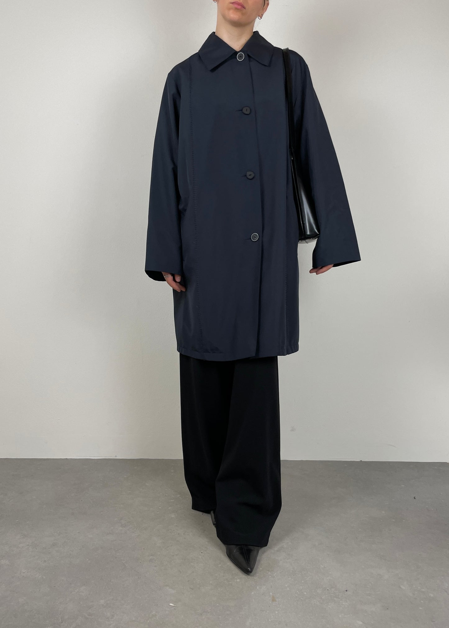 Minimal blue raincoat