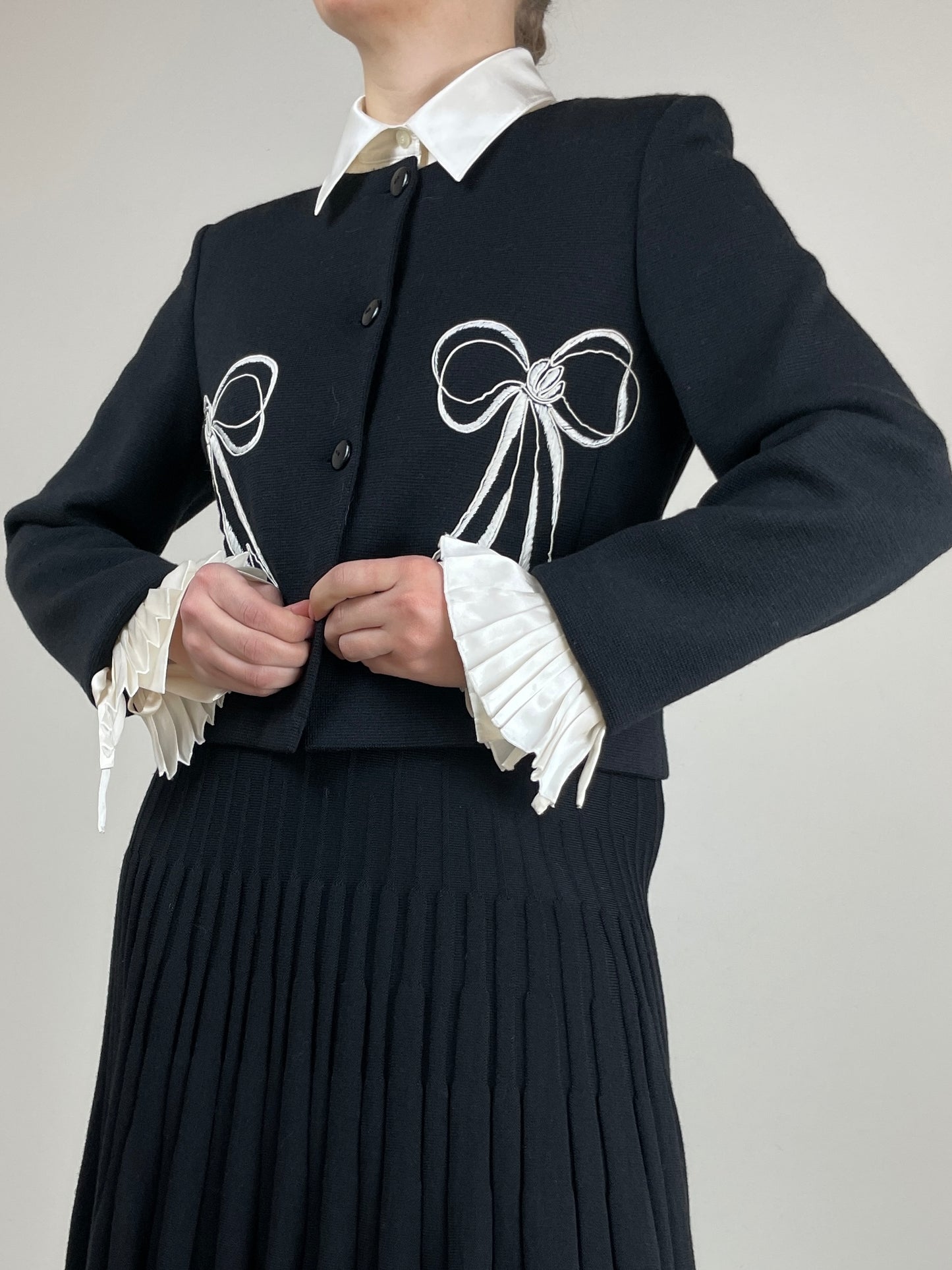 Giacca in maglia di lana e seta con fiocchi