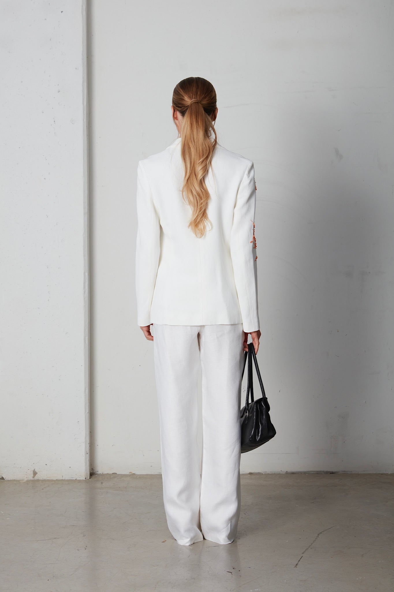 Blazer con ricamo a corallo