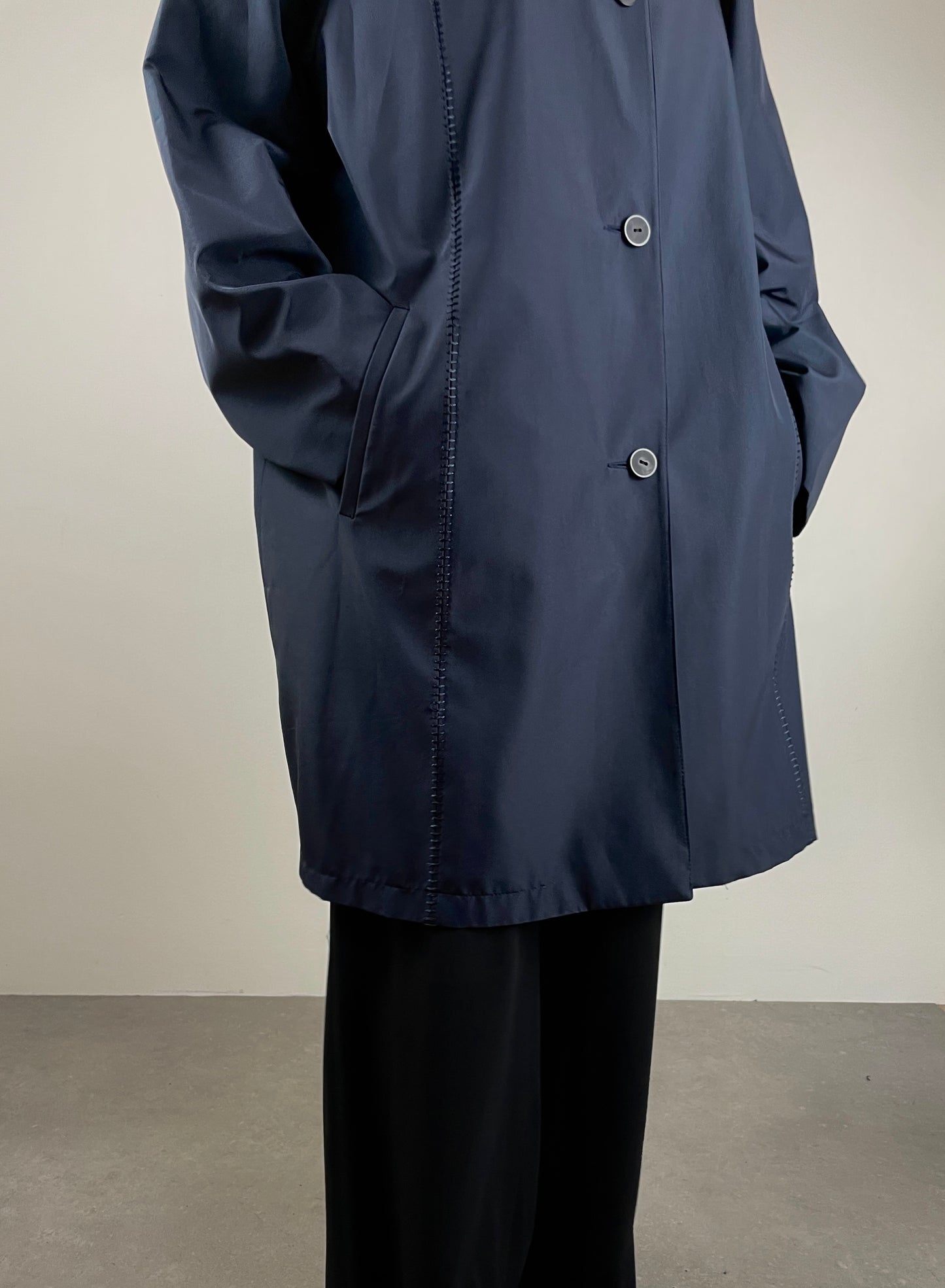 Minimal blue raincoat