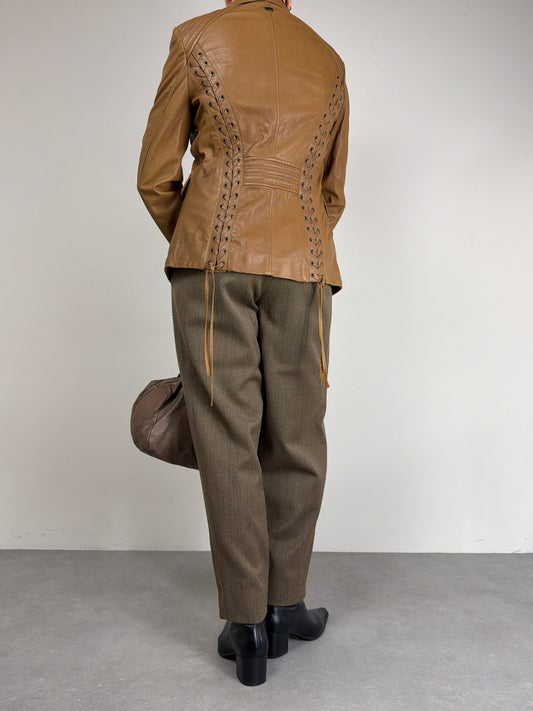 Giacca in vera pelle vintage con intrecci sul retro