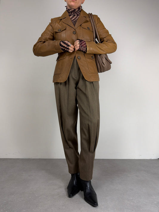 Giacca in vera pelle vintage con intrecci sul retro