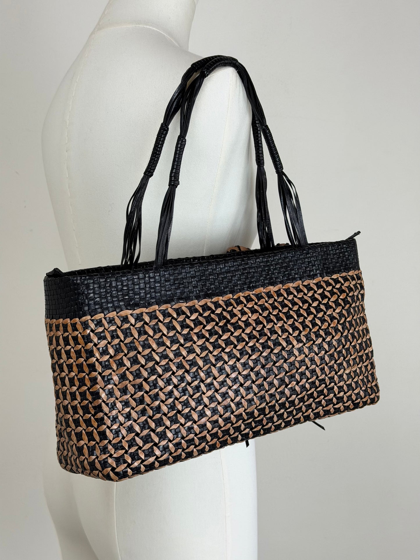 Borsa vintage in vera pelle intrecciata