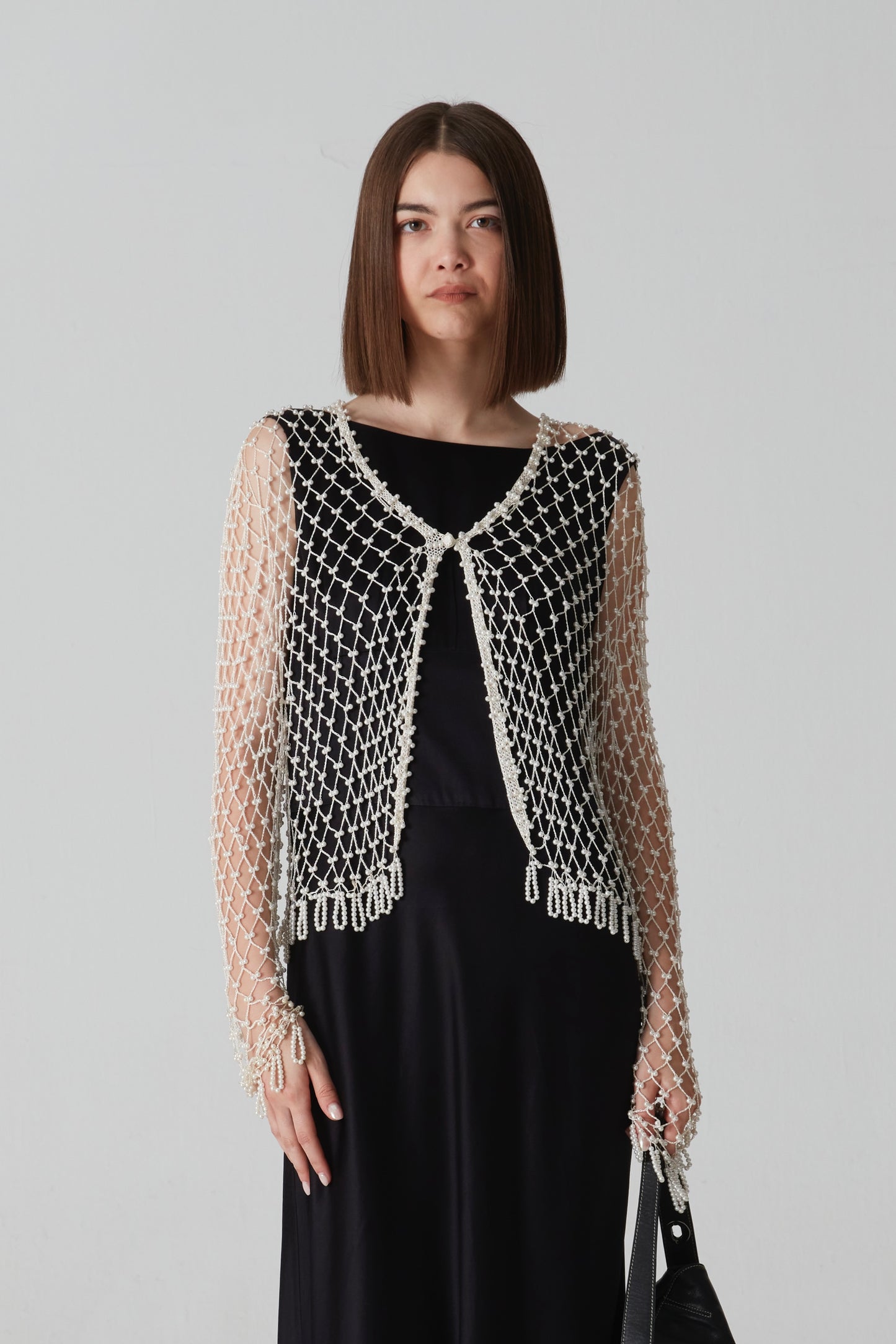 Cardigan all’uncinetto con perline