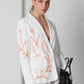 Blazer con ricamo a corallo