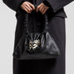 Borsa in vera pelle con farfalla in metallo rimovibile