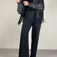 Chiodo vintage in pelle con frange e rose