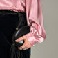 Clutch vintage in pelle