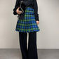 Gonna a pieghe in fantasia tartan con alamari