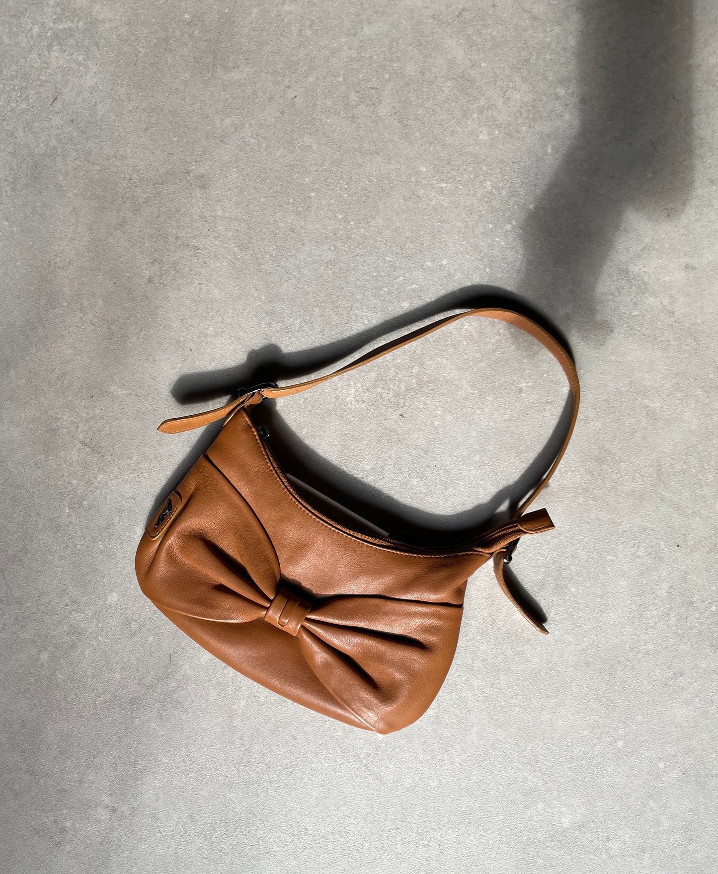 Bow leather bag