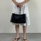 Shopper in vera pelle nera con inserti bianchi