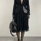 Blazer nero con ricamo intagliato