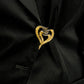 Spilla a cuore astratto