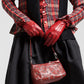 Borsetta in vera pelle bordeaux con occhielli