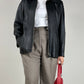 Giacca minimal in vera pelle nera