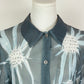 Camicia con motivi termopressati