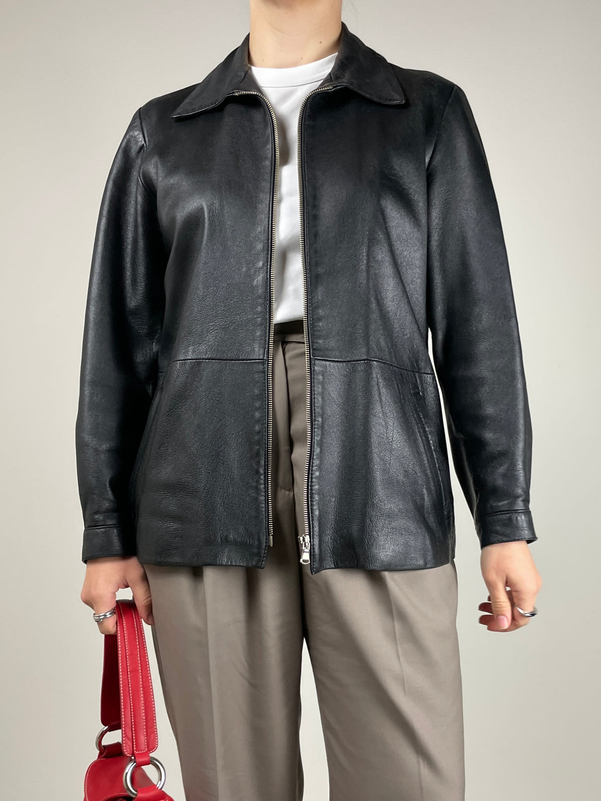 Giacca minimal in vera pelle nera