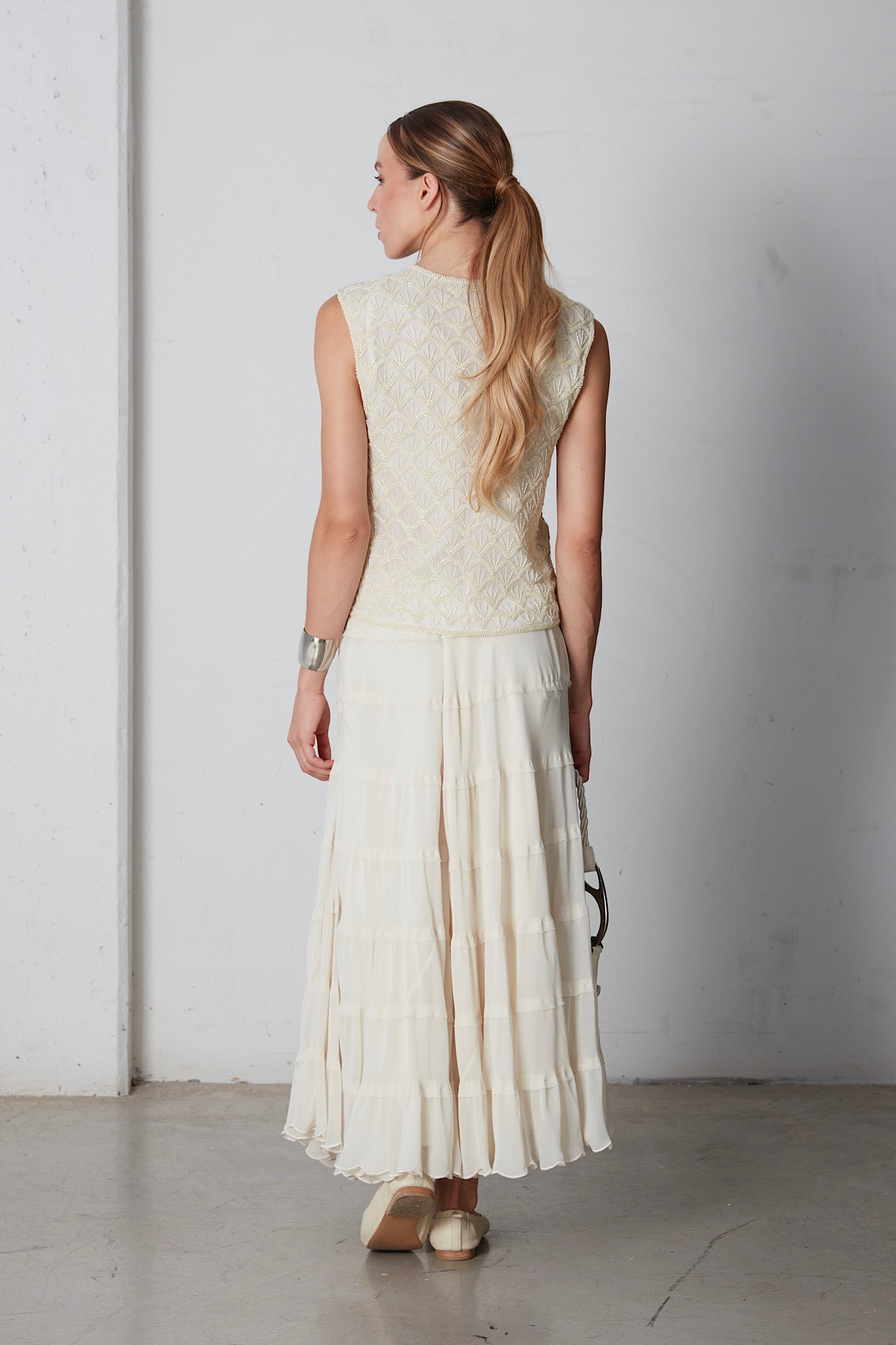 Gilet in seta ricamato con perline