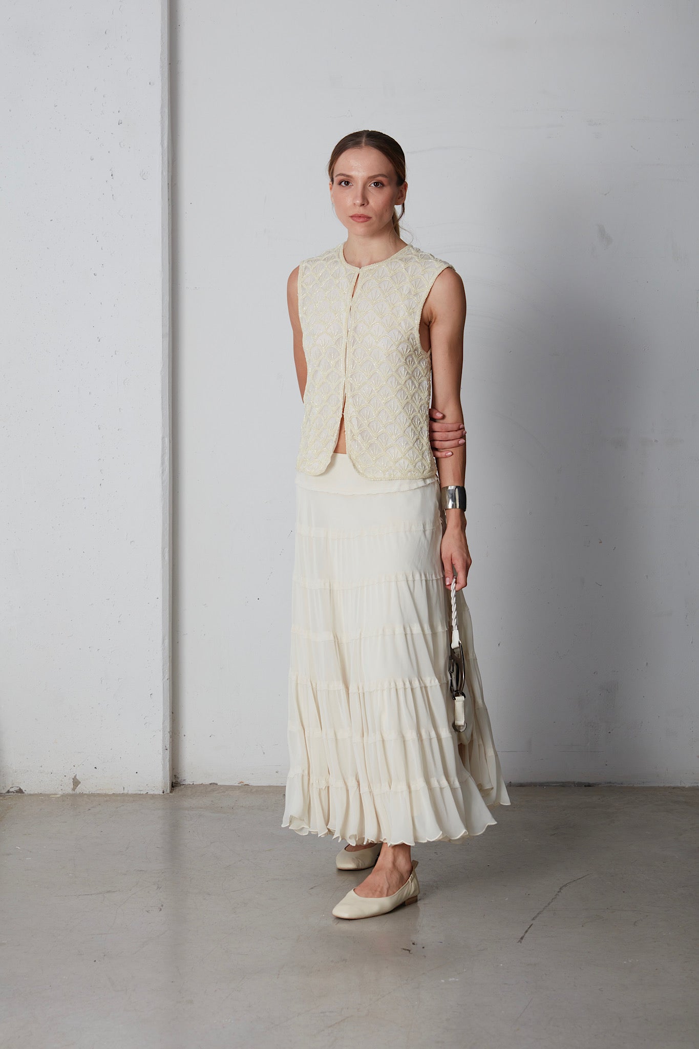 Gilet in seta ricamato con perline