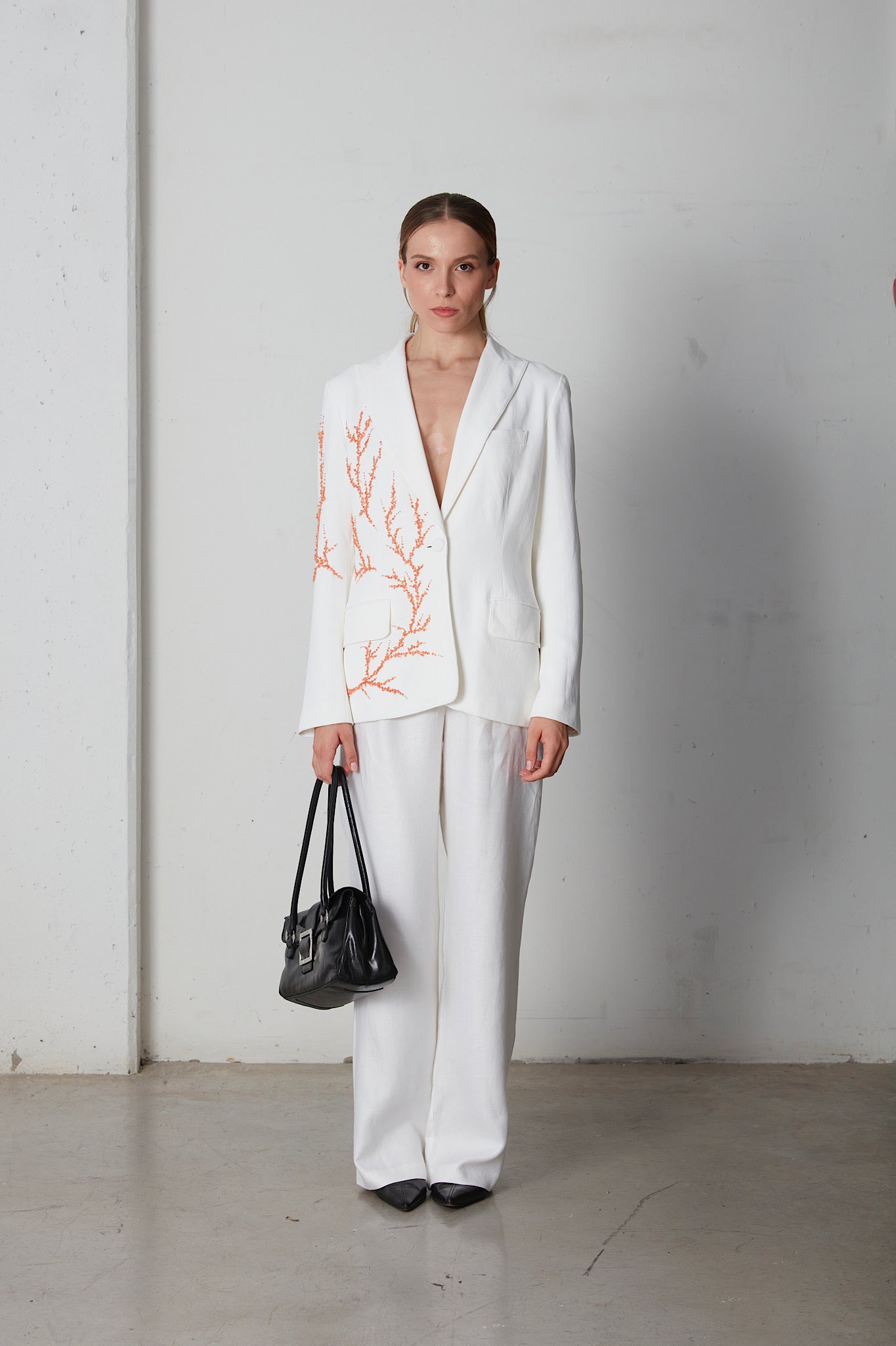 Blazer con ricamo a corallo