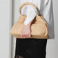 Borsa in vera pelle con manici in metallo