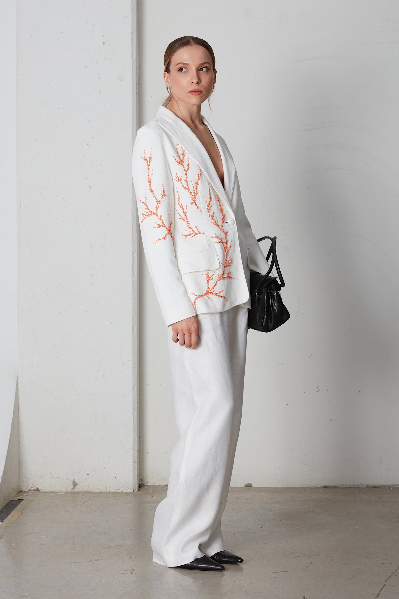 Blazer con ricamo a corallo