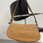 Borsa in vera pelle con dettagli in metallo
