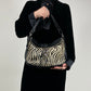 Borsa in vera pelle con pannello in cavallino zebrato