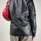 Giacca minimal in vera pelle nera