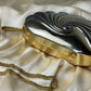 Vintage shell clutch