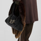 Borsa in vera pelle con farfalla in metallo rimovibile